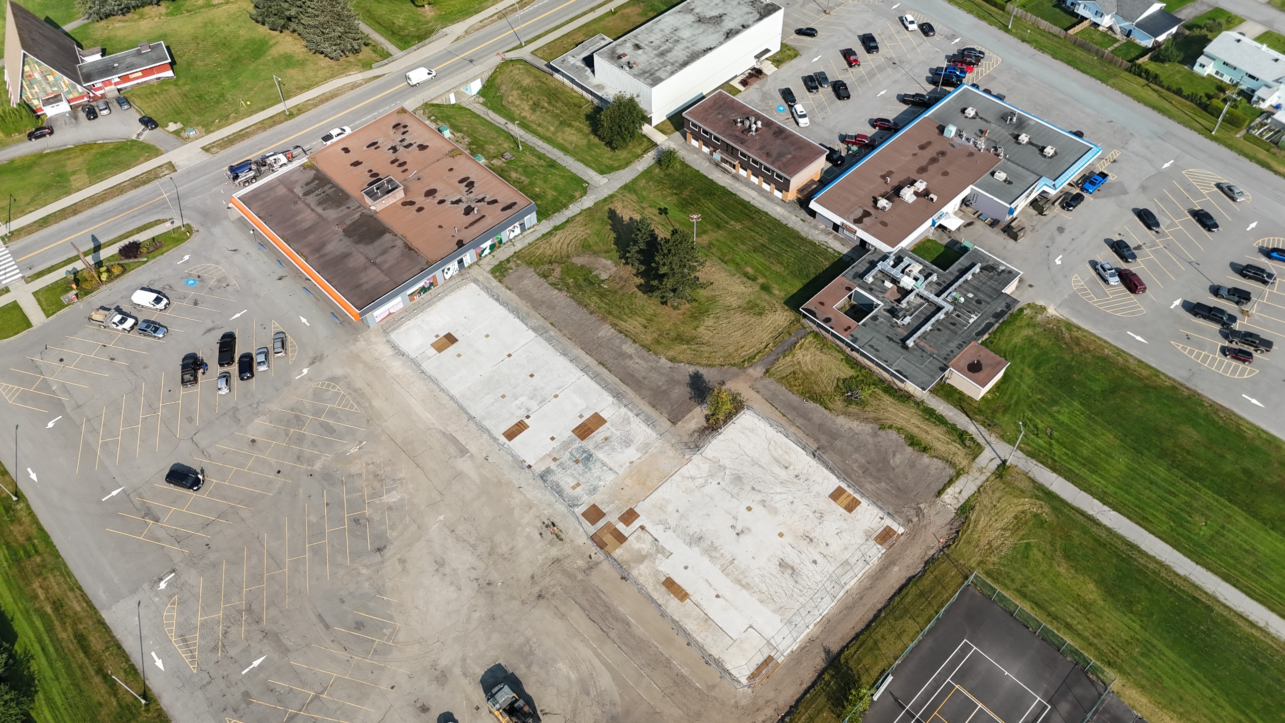 An aerial photo showing an empty, concrete property.